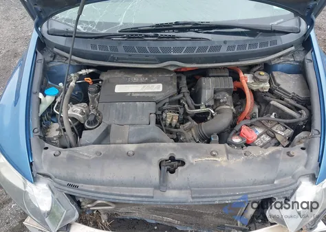 2009 Honda Civic Hybrid from USA, damaged, VIN JHMFA362X9S012707